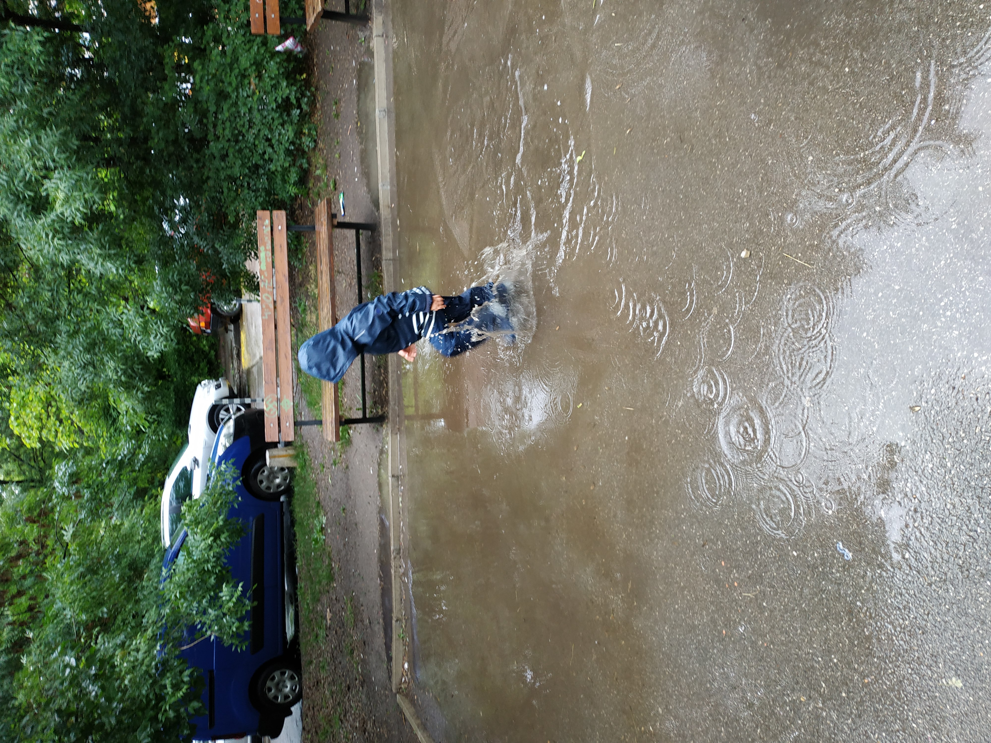 Kid running in rain